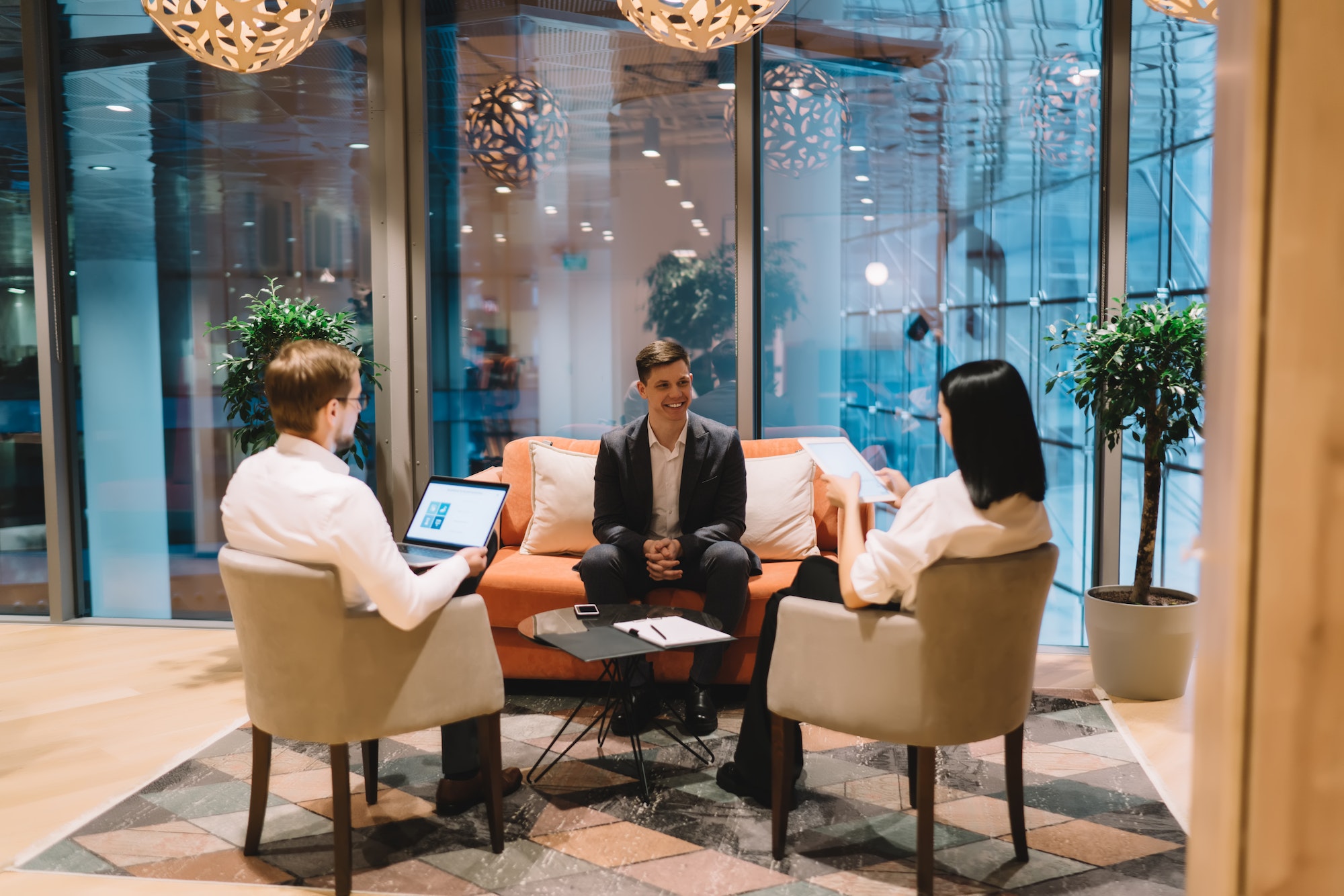 recruiters-interviewing-candidate-for-job-in-modern-workplace